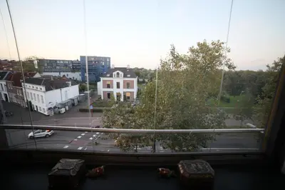 a view from a window of a city street at B&B de singel in Utrecht