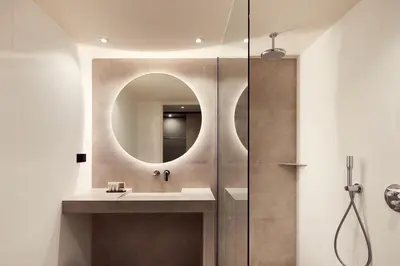 a bathroom with a sink and a mirror at Van der Valk Hotel Hilversum/ De Witte Bergen in Hilversum