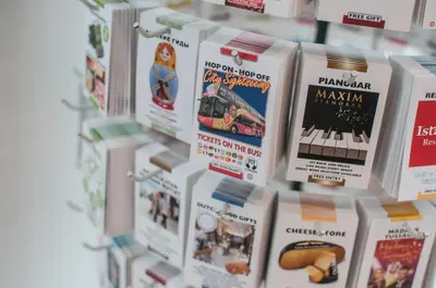 a bunch of books on display in a store at Hotel Fine Harmony in Amsterdam