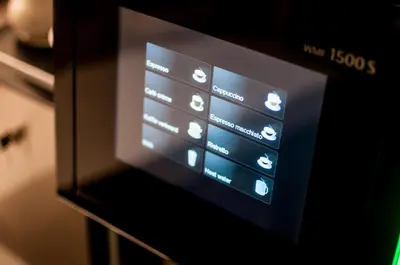 a microwave oven with a bunch of icons on it at Hotel Fine Harmony in Amsterdam