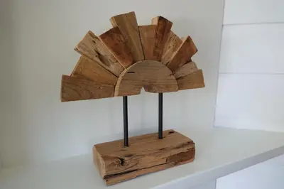 a wooden flower on top of a shelf at Ithaka Beach House, unieke plek met vrij parkeren! in Noordwijk