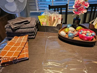 a table with a tray of food and a plate of candy at Slapen in Tuitje in Tuitjenhorn