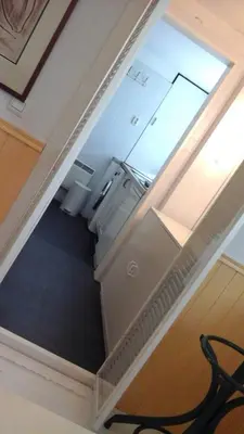an overhead view of a room with a stairway with a window at Studio 99 in Amsterdam