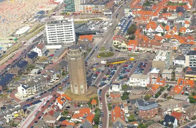 an aerial view of a city with a clock tower at Hotel Anna in Zandvoort