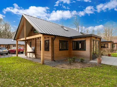 a small house with a metal roof at Scilla in Soesterberg