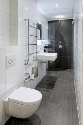 a bathroom with a toilet and a sink at Marnix360apartments The Mansion Suites in Amsterdam
