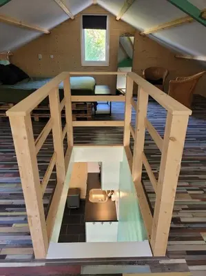 a tiny house is being built in the attic at Gastenverblijf rustig gelegen nabij strand en duin in Heiloo