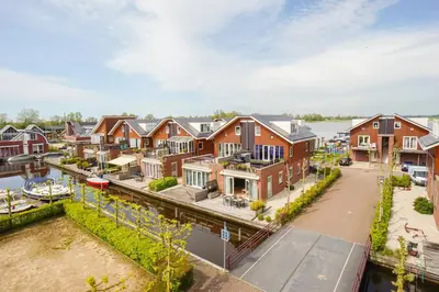 an aerial view of houses in a city at Meerzicht 59 - Ideal family appt for 6 persons in Uitgeest