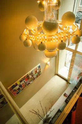 a chandelier hanging from the ceiling in a room at Hotel Cornelisz in Amsterdam