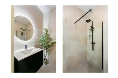 a bathroom with a sink and a shower at Stylish apartment next to the Amstel River - Unit A in Amsterdam