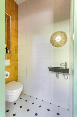 a bathroom with a toilet and a sink at Stylish apartment next to the Amstel River - Unit B in Amsterdam