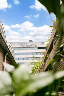 a building with a sign on the side of it at Stylish apartment next to the Amstel River - Unit C in Amsterdam