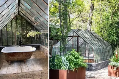 a greenhouse with a bath tub and plants in it at Magical Woods in Bergen
