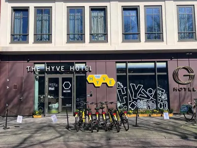 a group of bikes parked in front of a store at The Hyve Capsule hostel Amsterdam in Amsterdam