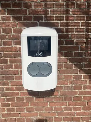 a white object is attached to a brick wall at Nieuwendijk hoeve in Oud-Ade