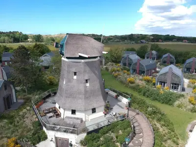 an aerial view of a house with a train around it at Zonnestralen in Egmond aan den Hoef