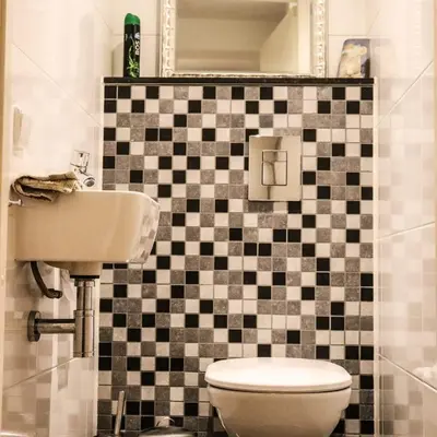 a bathroom with a toilet and a sink at Atlantis 15b in Egmond aan Zee