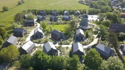 an aerial view of a village with houses at Villa Zon & Duin in Egmond aan den Hoef