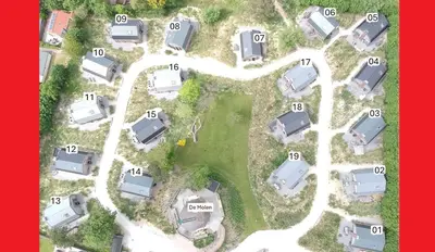 an aerial view of a parking lot with parked cars at Villa Duinhuis Zee in Egmond aan den Hoef