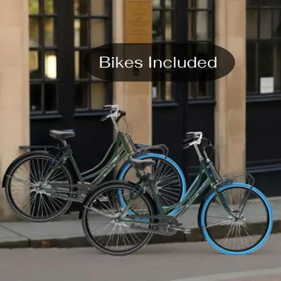 two bikes parked next to each other on a sidewalk at DomCity Apt Near Amsterdam Bikes Included One mile to City Centre in Utrecht