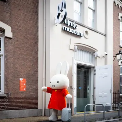 a stuffed rabbit standing in front of a building at DomCity Apt Near Amsterdam Bikes Included One mile to City Centre in Utrecht