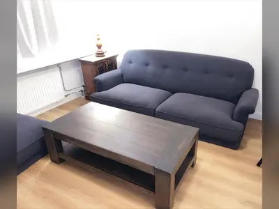 a living room with a couch and a coffee table at DomCity Apt Near Amsterdam Bikes Included One mile to City Centre in Utrecht