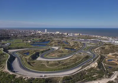 an aerial view of a road with a city in the background at Bella Cottage Zandvoort in Zandvoort