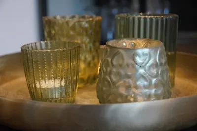 a group of three glasses sitting on a table at natural green loft in Bergen