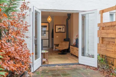 an open door leading into a living room at Petitville in Austerlitz