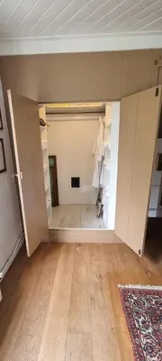 an empty room with a closet in a house at Beautiful renovated Farmhouse in Ankeveen