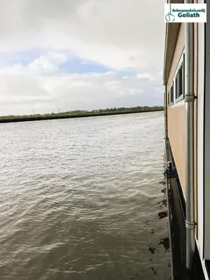 a boat on a body of water at Houseboat Tjonger NS003 in Monnickendam