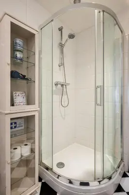 a shower with a glass enclosure in a bathroom at Suite with private bathroom near Vondelpark in Amsterdam