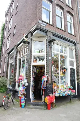 a store front of a brick building with a store at Studio Jordaan Amsterdam City Centre in Amsterdam