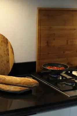a pan of food sitting on top of a stove at Studio Jordaan Amsterdam City Centre in Amsterdam