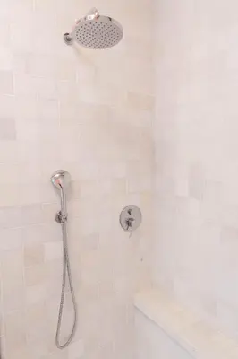 a shower with a shower head in a bathroom at Ben bij Bos in Oude-Niedorp