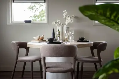 a dining room table with chairs and a table with glasses at Loft 48 in Haastrecht
