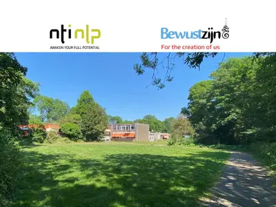 a view of a yard with trees and a building at Het Huis van Bewustzijn in Limmen
