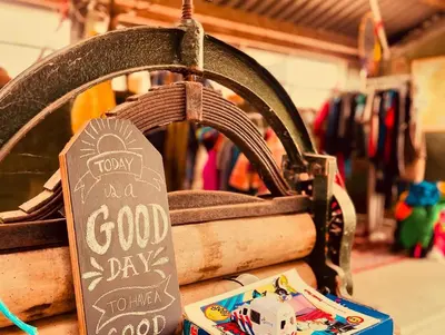 a good day chalkboard sign in a store at Vintage caravan in old orchard at farm Huize Blokland in Hem