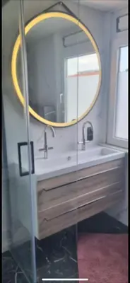 a bathroom with a sink and a mirror at Garden, Jacuzzi, bbq, city centre, 2 bedrooms in Alkmaar