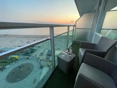 a balcony with a view of an airport at Beach Loft in Zandvoort