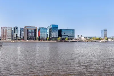 a large body of water in front of a city at Central Art Apartment - Nieuwmarkt area in Amsterdam