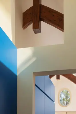 a room with a window and a wooden beam at Central Art Apartment - Nieuwmarkt area in Amsterdam