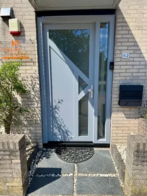 a door to a home with a glass door at Amsterdam Edge Haven in Purmerend