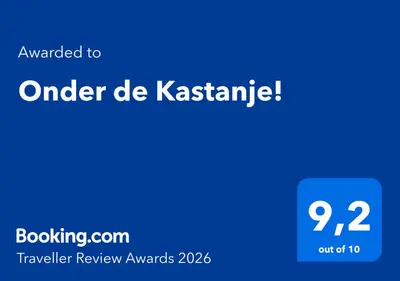 a blue sign with the words under be kasharma at Onder de Kastanje! in Koedijk