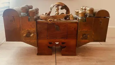 an old wooden chest with at Stunning Island Home with African Asian Vibe in Oude Meer