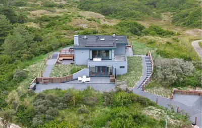an aerial view of a house on a hill at Stunning Home In Bergen Aan Zee in Bergen aan Zee