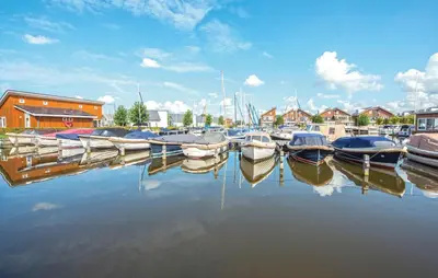 a group of boats are docked in a marina at Oostergeest 3 6P in Uitgeest