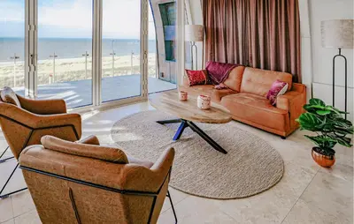 a living room with couches and a coffee table at Shrimp in Egmond aan Zee