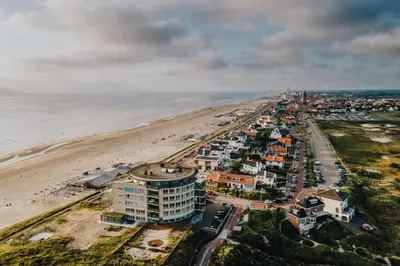 an aerial view of a beach and a city at Zaras Studio Hermes in Zandvoort
