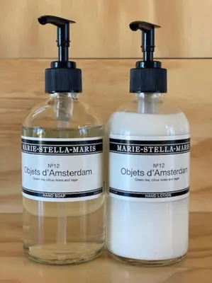 two bottles of soap sitting on top of a table at Huisje te huur van 15 feb tot 15 mrt voor tweeduizend euro vier weken in Zevenhuizen